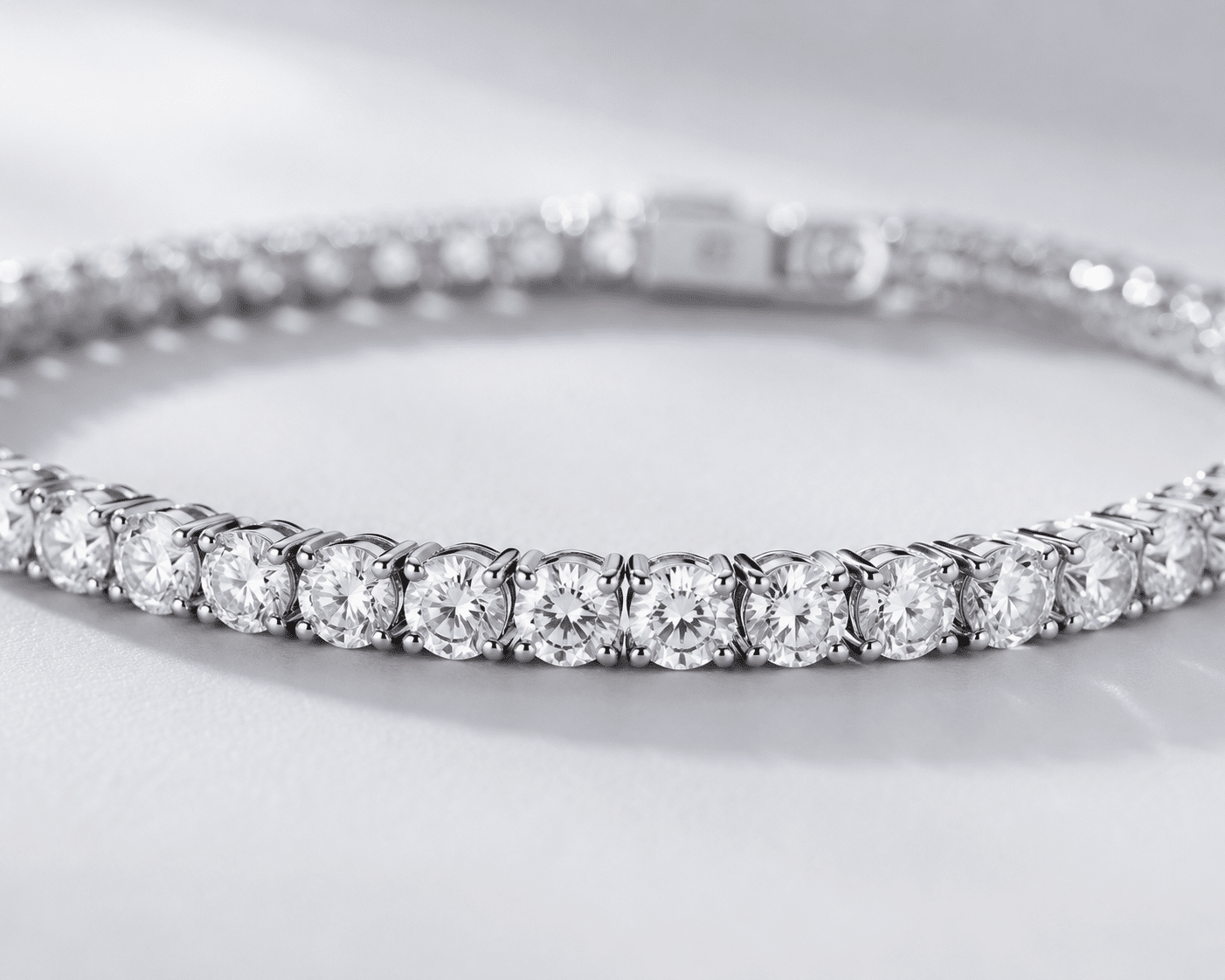 Close-up view of a lab-grown diamond tennis bracelet showing the repeated pattern of individually set stones