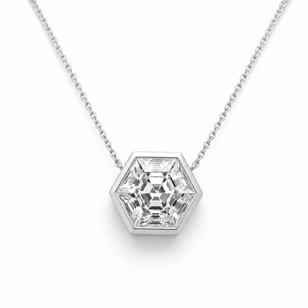 A modern geometric lab-grown diamond pendant featuring a hexagonal diamond in a thin white gold bezel, shown against a white background to emphasize negative space